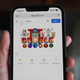 A photo of the iPhone with the Safari browser pointed to the Google search page